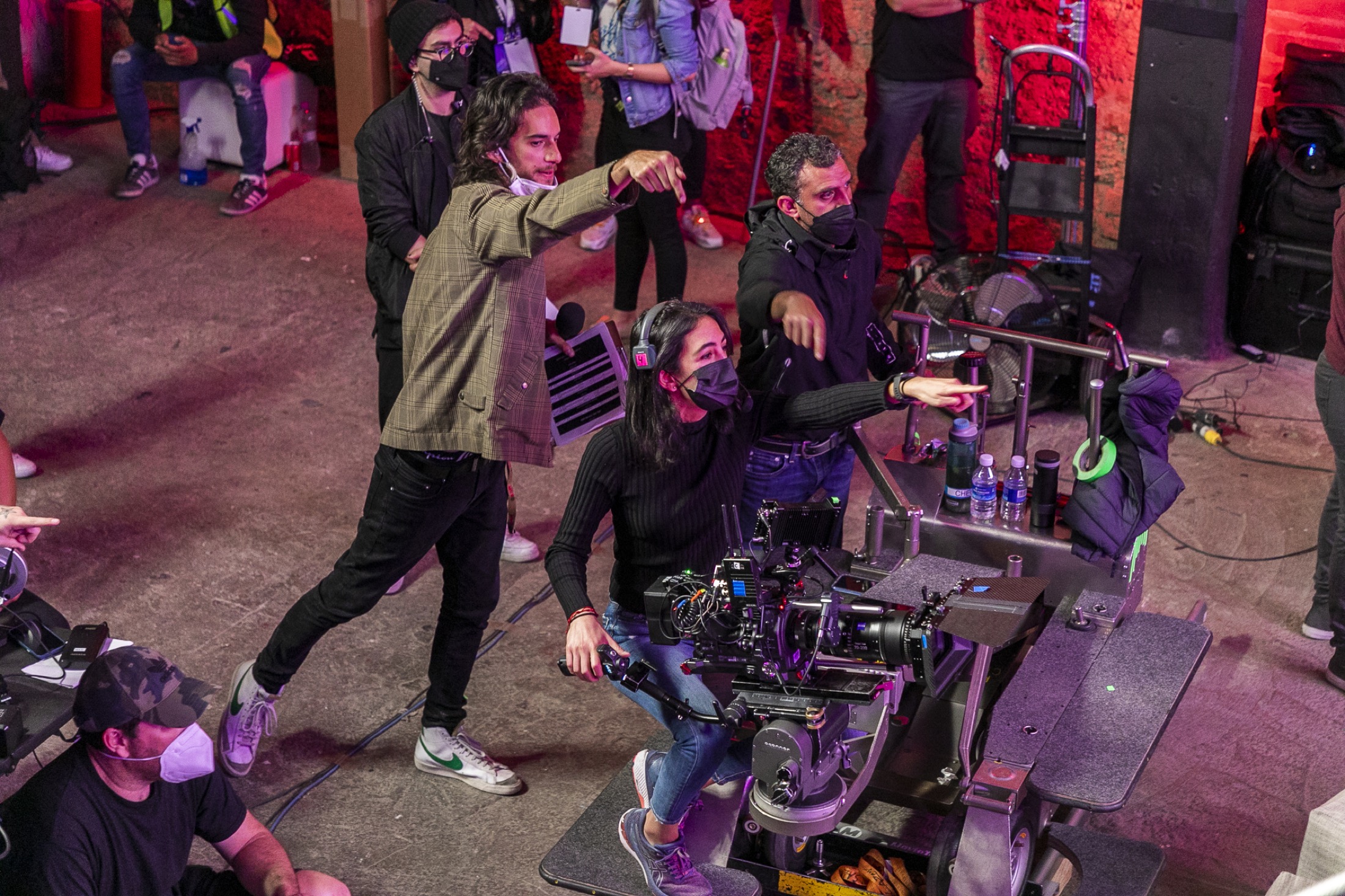 Romero & Braas crew directing on a studio set